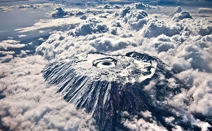 mount kilimanjro by across serengeti